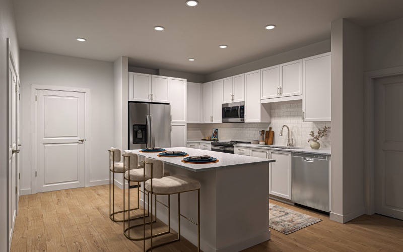 a kitchen with white cabinets